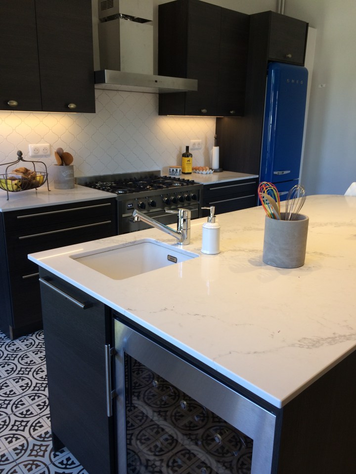 wine fridge, bar sinks, marble counters, working kitchens.